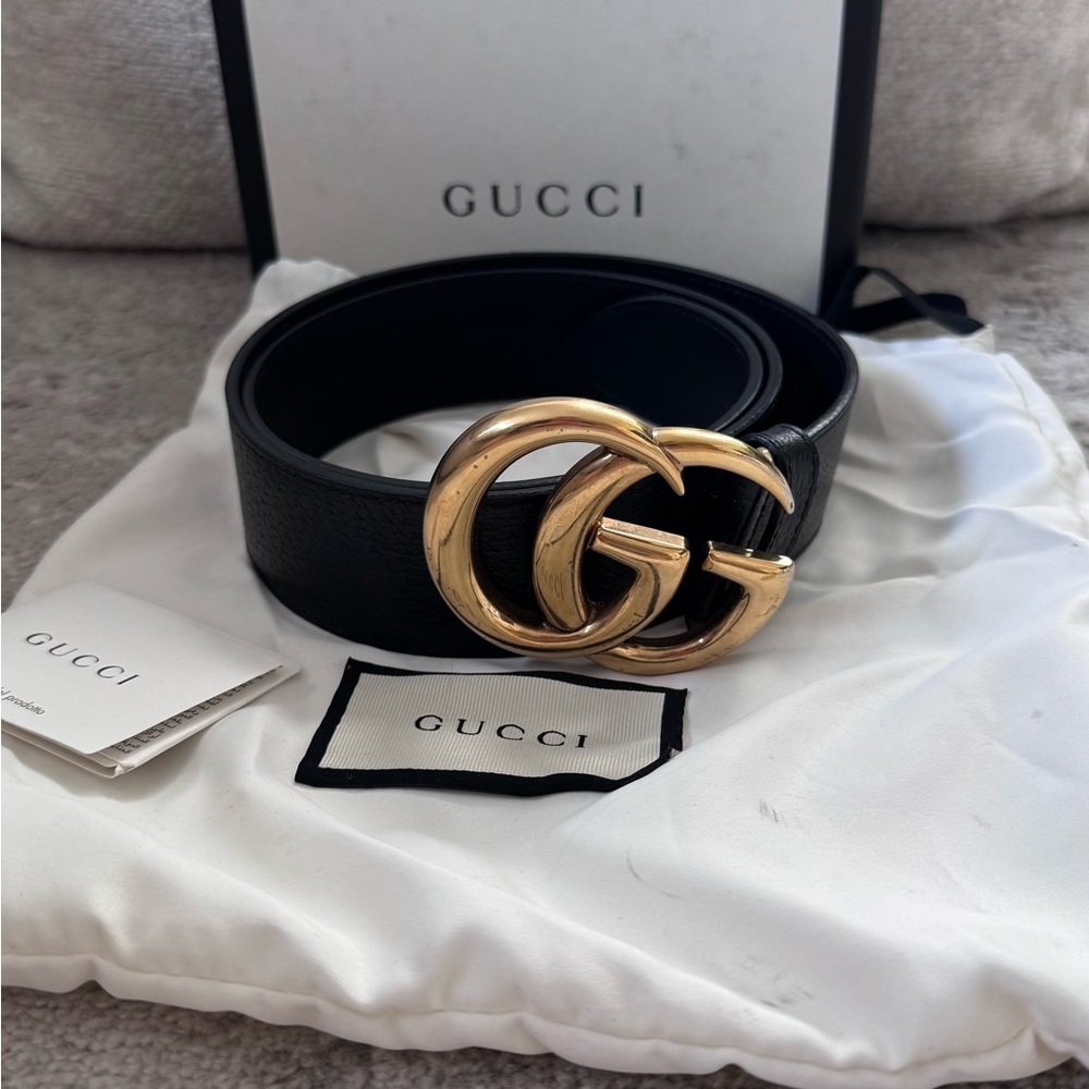 Gucci Black and Gold Leather Belt with Iconic GG Buckle